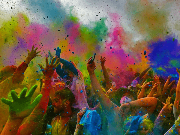 People-drenched-in-bright-colors-celebrating-Holi-Liberty-India