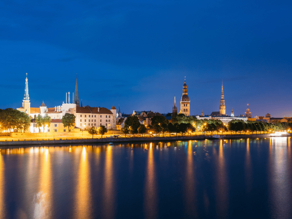 Evening In Riga, Latvia. Night View With Blue Sky