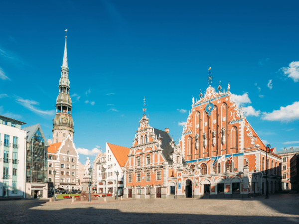 House of the Blackheads and St. Peter’s Church in Riga, Latvia – a must-visit destination for travelers exploring with a DMC in Latvia.