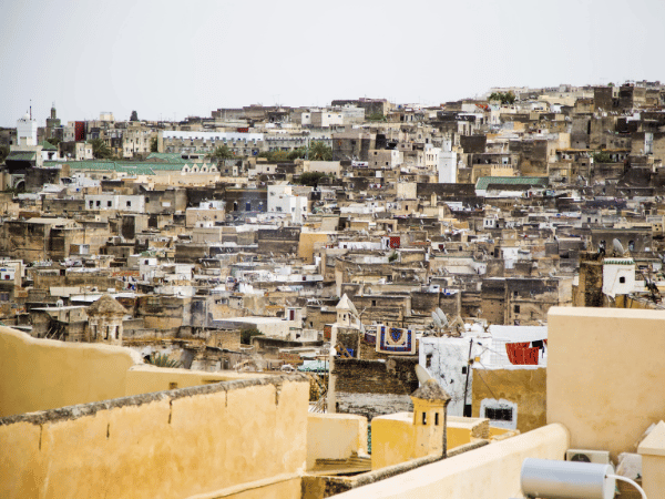 A detailed street view of the old medina in Fez, an authentic cultural experience arranged by a DMC in Morocco.