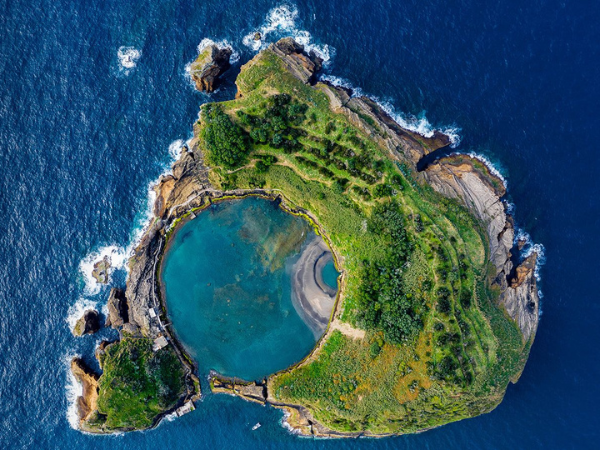 A bird's-eye view of the unique Ilhéu de Vila Franca in the Azores, Portugal.