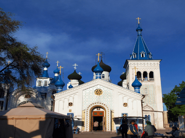 Holy Resurrection Cathedral Bishkek, a Russian Orthodox cathedral with golden domes, in Kyrgyzstan.